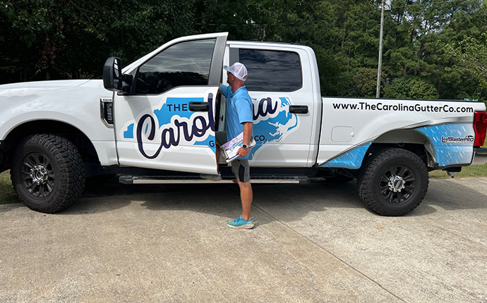 Chris with the Company Vehicle