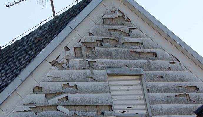 Hail damaged house roof