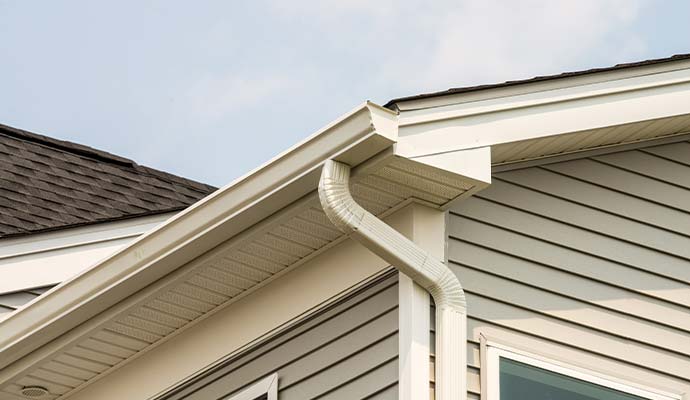 Home with properly installed and cleaned gutters
