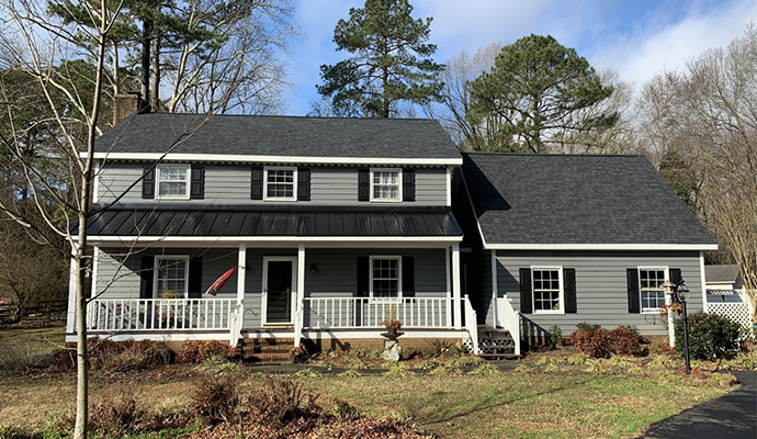 House With Roof and Metal Panels