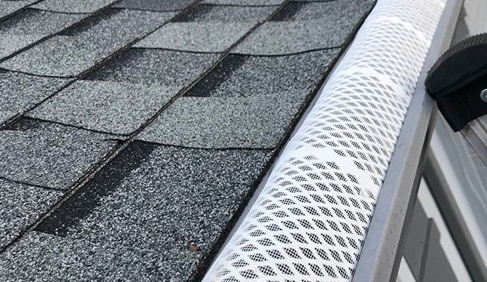 White mesh reverse curved gutter protection